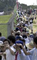 27,000 people form human chain around U.S. Kadena Air Base